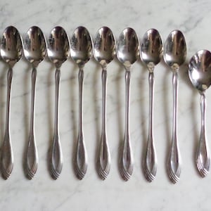 Oneida Community HEIRESS Stainless 7 3/8 inch Set of 8 Ice Tea Spoons & 1 Shell Sugar Spoon