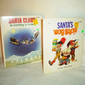 Santa&#39;s Toy Shop and Santa Claus if Coming to Town 1980 Playmore inc Dean Board Books