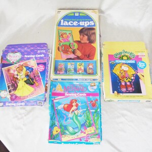 Whitman Roseart Karty do szycia Mała Syrenka, Piękna i Bestia, Cabbage Patch Kids+