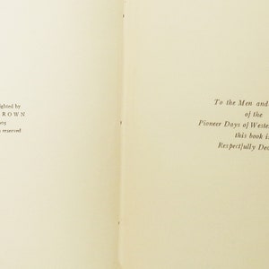 May include: Open book pages with text. The left page reads "Copyrighted by S. W. BROWN 1905 All rights reserved." The right page reads "To the Men and Women of the Pioneer Days of Western Wisconsin this book is Respectfully Dedicated."