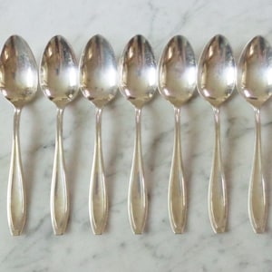Adonis Pat Apr 17 17 Simeon L George H Rogers Co XII Silver Plate 6 inch Set of 7 Teaspoons