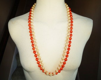 Lucite Beaded Necklaces Orange & Beige 30 inch, set of 2 from the 1980s