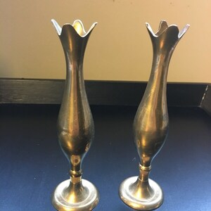 Set of two small mid century brass candle holders tulip shaped