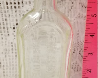 Vintage Dr. W.B. Caldwell's clear bottle with cork stopper.