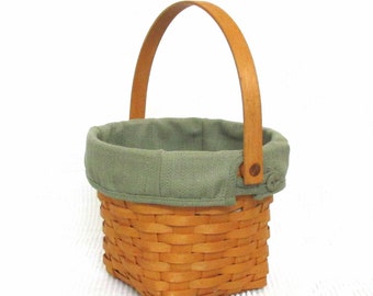 Vintage 2001 Longaberger handwoven classic basket with movable handle and green liner storage home accent made in USA