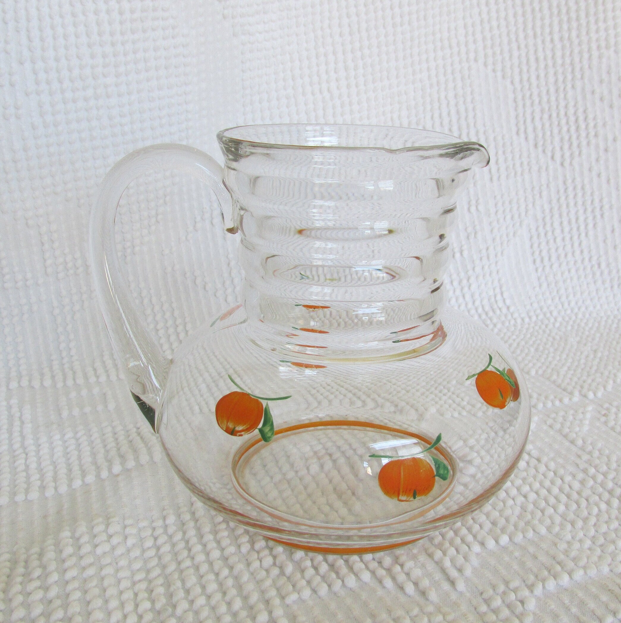 Vintage Red Apple and Orange glass juice pitcher/decanter Etched glass  handle and pour spout - Pitchers & Carafes, Facebook Marketplace