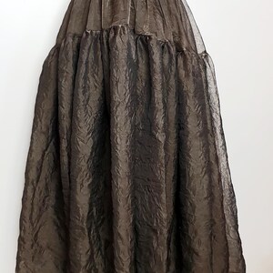 Long, flowing green steampunk bohemian skirt with elasticated waist, women's ethnic bohemian dance clothing, wide, medieval outfit, boho