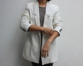 Minimal white blazer