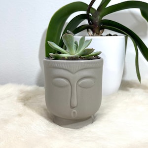 Unique &quot;Om&quot; Ceramic Face Planter | Small Gray Zen Face Houseplant Pot | Round Dark Beige Pedestal Head Planter