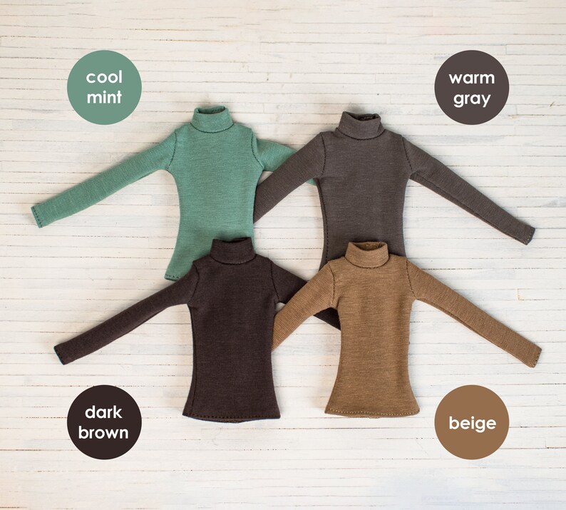 May include: Four long-sleeved turtlenecks in different colors: cool mint, warm gray, dark brown, and beige.