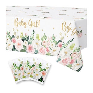 May include: White tablecloth and napkins set with a floral design in pink, white, and green. The tablecloth has the text "Baby Girl!" in gold script. The napkins have a matching floral pattern.
