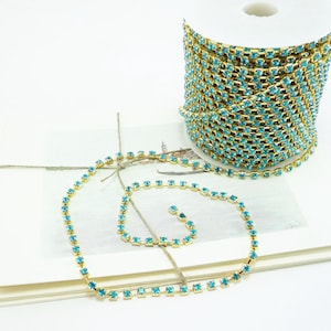 Gold Rhinestone Chain, Aquamarine Crystal, (4mm / 1 Yard Qty)