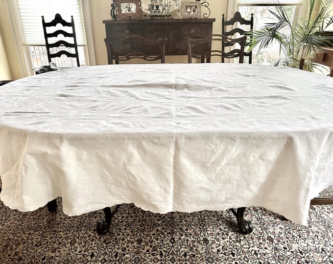 Featured listing image: Tablecloth 8 Napkins, White Matelasse Oval Tablecloth Set, 8 Matelasse Scalloped Napkins, 76 x 84 Inch Tablecloth, 18 Inch Napkins,