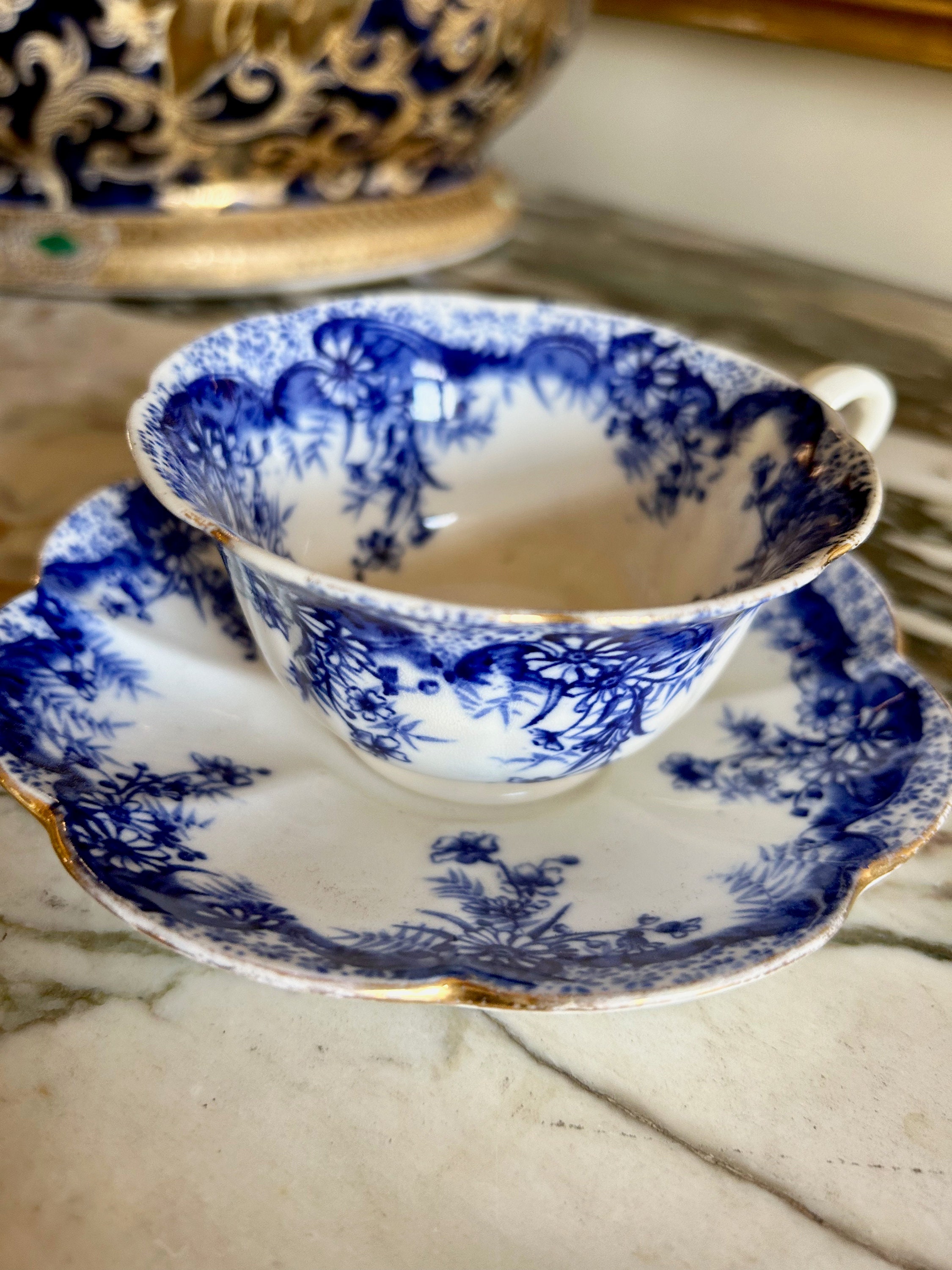 Collectible cups and hot sale saucers