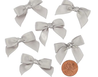 Silver Bows | Small Silver Bows | Silver Satin Bows - 1 3/8in. x 1in. - 50 Pieces (pm601399)