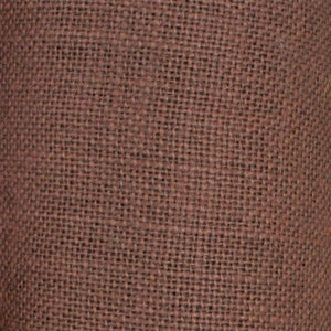May include: Close-up of a brown burlap fabric with a woven texture.