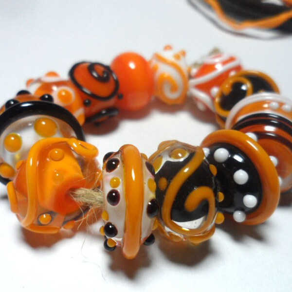 Lampwork. Glass bead handmade. Beads white, black, yellow.