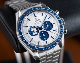 Omega Speedmaster Anniversary Series Co-Axial Master Chronometer Chronograph 42mm 310.31.42.50.02.001  Silver Snoopy Award.
