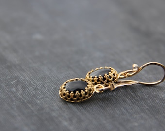 Small oval black onyx and gold bezel set dangle earrings, classy, elegant earrings, short, petite, everyday, special occasion. gold fill