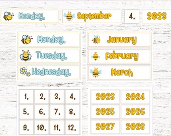 May include: A set of bee-themed classroom calendar cards. The cards feature a yellow and black bee illustration and include the days of the week, months of the year, and numbers 1 through 12. The cards are designed to be used as a flip calendar for a classroom.
