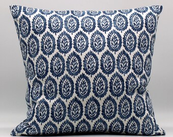 May include: A blue and white patterned throw pillow with a paisley design. The pillow is made of a soft, comfortable fabric and is perfect for adding a touch of style to any room.