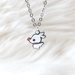 May include: A silver chain necklace with a white enamel charm of a cartoon dog with a red nose. The charm is in the shape of a ghost.