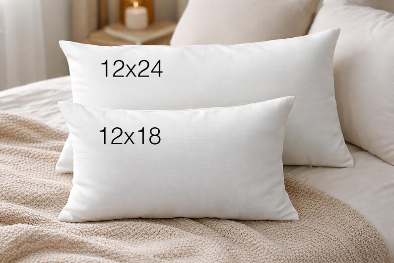 two white pillows on a bed, with text indicating their sizes.