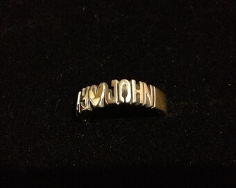 Hand Carved Ring With Two Names And Heart In The Middle ( Round Ring )