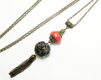Long pendant necklace, bronze jewelry, long pompom pendant, orange red beaded necklace