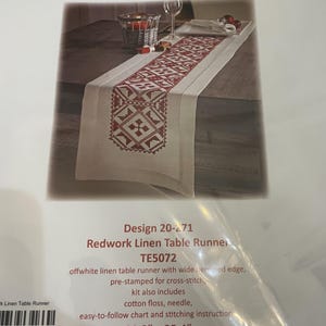 May include: A Duftin Design 20-271 Redwork Linen Table Runner kit featuring an off-white linen table runner with a wide hemmed edge and a pre-stamped geometric cross-stitch pattern. The kit includes cotton floss, a needle, a chart, and instructions, measuring 11.8 inches by 35.4 inches.