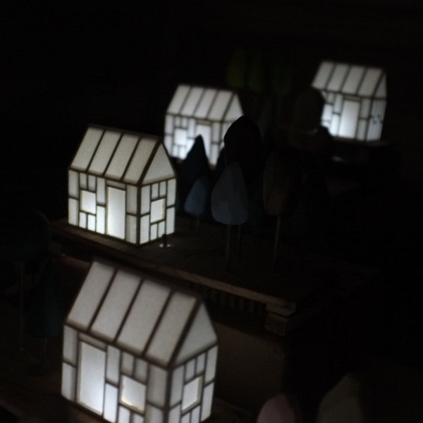 Miniature house light with subtle pastel trees on a antique Victorian wood base