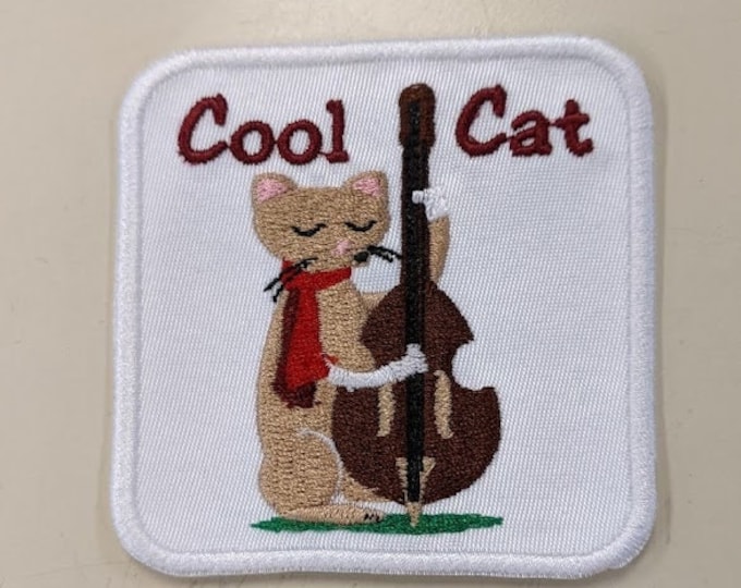 Cat strumming bass embroidery design