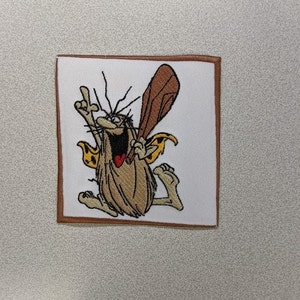 Prehistoric Cartoon Character Embroidered Patch