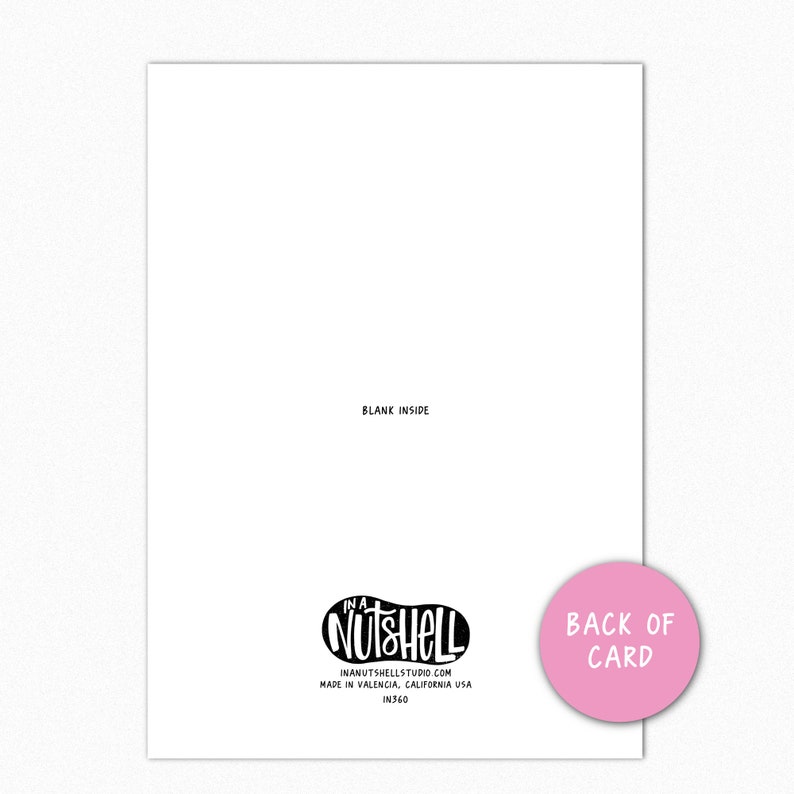 May include: A blank white card with a pink circle on the bottom right corner that says "Back of Card". The card has a black and white logo in the bottom left corner that says "In a Nutshell" with the website address and "Made in Valencia, California USA" printed below the logo.