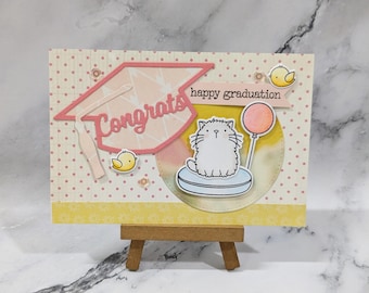 Tarjeta de graduación hecha a mano: Gato rosa con globo