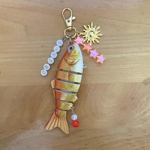 Verträumter Goldfisch Taschenanhänger