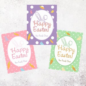 May include: Three printable Easter gift tags with a bunny ear design and the text "Happy Easter!"  Each tag has a different background color: purple, pink, and green. The text "Your Friend, Oscar" is at the bottom of each tag.