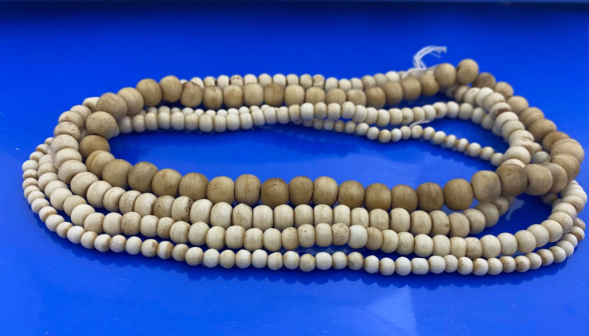 thumbnail image 2 of Antiqued White Buffalo Bone Crow Beads - 9mm X 6mm, 3mm Hole, 60/strand - Handmade 2 of 2