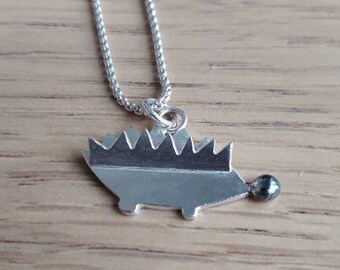 Silver British Hedgehog Pendant. Hedgehog with an oxidised nose.