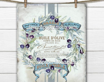May include: A vintage label for olive oil from the French region of Nice. The label features a wreath of olive branches with olives, a blue ribbon with the text "HUILE D'OLIVE" and "COMTÉ DE NICE (FALICON OIL)", and the text "EXTRA-SUBLIME" in a decorative font. The label is on a light blue background with a white border.