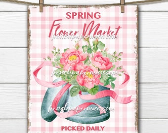 May include: A pink and white gingham background with a blue and white flower pot with pink roses and a pink ribbon. The text "SPRING FLOWER MARKET" is at the top of the sign. The text "PICKED DAILY FRESHNESS GUARANTEED" is at the bottom of the sign.