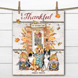 May include: A watercolor illustration of a brick house with a door decorated with fall leaves and a wreath. Two gnomes, a black cat, a golden retriever, and a border collie are standing in front of the house. The text "We are Thankful" and "101 Autumn Lane" is above the door. The text "Family Photo" is below the animals.