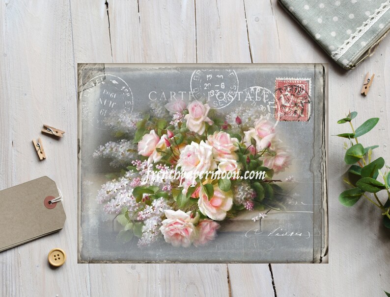 May include: A vintage postcard with a faded background featuring a bouquet of pink roses and white lilac flowers. The postcard has a French stamp and the text "CARTE POSTALE" printed on it.
