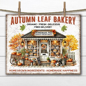 May include: A rustic sign for Autumn Leaf Bakery, featuring a quaint shop with pies and pumpkins. The sign reads "Autumn Leaf Bakery" with text that says "Organic, Fresh, Delicious, Free Delivery, Homemade Pies, Baked Fresh Daily, Homegrown Ingredients, Homemade Happiness."