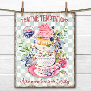 May include: A vintage-style sign with a chequered background and the text "Teatime Temptations". A stack of teacups and saucers is topped with a pink cupcake. The sign also says "Premium Quality" and "Afternoon tea served daily".