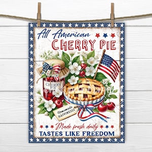 May include: A patriotic print featuring a cherry pie, jar of cherry preserves, and an American flag. The words "All American Cherry Pie" are displayed in red and white, with the phrases "Made fresh daily" and "Tastes like Freedom" below.