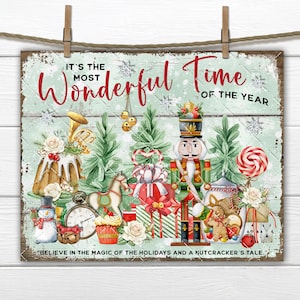 Puede incluir: Un cartel navideño de estilo vintage con un esquema de colores verde, rojo y blanco. El cartel presenta un cascanueces, una casa de jengibre y un bastón de caramelo. El texto en el cartel dice "Es la época más maravillosa del año. Cree en la magia de las fiestas y en el cuento de un cascanueces."