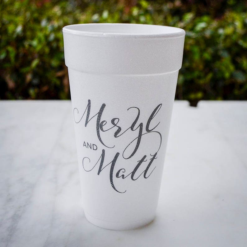May include: White foam cup with black text that reads "Meryl and Matt".
