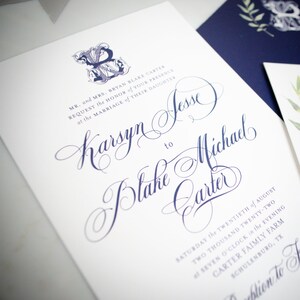 May include: Wedding invitation with a navy blue and white color scheme. The invitation features a calligraphic font and the text "MR. and MRS. BRYAN BLAKE CARTER REQUEST the HONOR of YOUR PRESENCE at the MARRIAGE of THEIR DAUGHTER Karsyn Jesse to Blake Michael Carter SATURDAY the TWENTIETH of AUGUST TWO THOUSAND TWENTY-TWO SEVEN O'CLOCK in the EVENING CARTER FAIMLY FARM SCHULENBURG, TX"