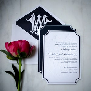 May include: A formal wedding invitation with black and white accents. The invitation features the names Mallory Louise and Walker James Whittaker, Jr. The wedding will take place on Saturday, September 14, 2019 at 6:00 PM at Hotel Ella in Austin, Texas.